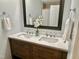 Updated bathroom features a double sink vanity, quartz countertops, and modern fixtures at 2101 S Roxboro St, Durham, NC 27707