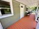 Inviting front porch with chairs, perfect for relaxing and enjoying the outdoors at 2101 S Roxboro St, Durham, NC 27707