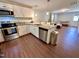 Modern kitchen with stainless steel appliances and granite countertops at 2101 S Roxboro St, Durham, NC 27707