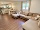 Open-concept living area features wood-look floors and seamless flow to the modern kitchen at 2101 S Roxboro St, Durham, NC 27707
