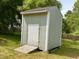 Small storage shed with double doors and a wood ramp at 2101 S Roxboro St, Durham, NC 27707
