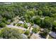 Aerial view of home at 2128 Watkins nestled amongst mature trees in a residential neighborhood at 2128 Watkins St, Raleigh, NC 27604