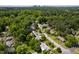 Aerial view of 2128 Watkins, surrounded by lush greenery, in a neighborhood with city views at 2128 Watkins St, Raleigh, NC 27604