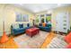 Cozy living room with natural light, hardwood floors, and comfortable seating arrangement at 2128 Watkins St, Raleigh, NC 27604
