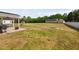 Spacious backyard with fire pit, patio, and ample room for outdoor activities with scenic views at 214 Thumper Way, Clayton, NC 27520