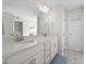 Bathroom featuring double vanity with white countertops and decorative tile floors at 214 Thumper Way, Clayton, NC 27520