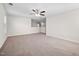 Neutral bedroom features a ceiling fan, carpet flooring, and plenty of space at 214 Thumper Way, Clayton, NC 27520