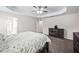 This secondary bedroom is spacious with neutral paint and carpet flooring at 214 Thumper Way, Clayton, NC 27520