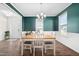 Cozy dining room featuring stylish chandelier, ample natural light, and attractive wall accents at 214 Thumper Way, Clayton, NC 27520