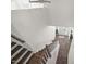 Staircase leading to the front door and hardwood floors at 214 Thumper Way, Clayton, NC 27520