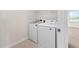 Convenient laundry room with a modern Samsung washer and dryer at 214 Thumper Way, Clayton, NC 27520