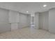 Unfinished basement featuring tile floor, recessed lighting and white walls at 2157 Dunn Rd, Raleigh, NC 27614