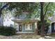 Charming home with a covered front porch and beautiful landscaping at 2157 Dunn Rd, Raleigh, NC 27614