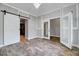 Dining room offers stylish flooring, contemporary lighting, and sliding door at 217 Carolina Town Ln, Holly Springs, NC 27540