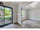 Inviting entryway with views into a dining room and the front yard at 217 Carolina Town Ln, Holly Springs, NC 27540