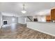Bright, open floor plan featuring a fireplace and access to the kitchen area at 217 Carolina Town Ln, Holly Springs, NC 27540