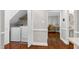 Hallway featuring a laundry area, with washer and dryer, and hardwood floors at 2205 Long And Winding Rd, Raleigh, NC 27603