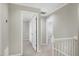 Upstairs hallway showing the access to different rooms at 2205 Long And Winding Rd, Raleigh, NC 27603