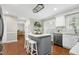 Kitchen with island seating and stainless steel dishwasher and sink at 2205 Long And Winding Rd, Raleigh, NC 27603
