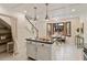 Bright eat-in kitchen with white cabinets, stainless appliances, and a cozy breakfast nook with bay window at 224 Heidinger Dr, Cary, NC 27511