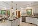 Well-designed kitchen with stainless steel appliances, ample counter space, and a sunlit breakfast nook at 224 Heidinger Dr, Cary, NC 27511