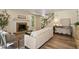 Bright living room with fireplace, hardwood floors, and coffered ceilings at 224 Heidinger Dr, Cary, NC 27511