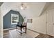 Cozy home office featuring a writing desk, wood floors, and a window for natural light at 224 Heidinger Dr, Cary, NC 27511