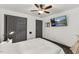 Bedroom featuring a ceiling fan, flat screen TV, and natural light from the window at 226 Smith Dr, Durham, NC 27712