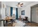 Office space with wood desk, comfortable chair, and cowhide rug at 226 Smith Dr, Durham, NC 27712