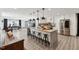 Open concept kitchen with a large island and stainless appliances at 226 Smith Dr, Durham, NC 27712