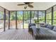 Inviting screened-in porch with comfortable seating and natural light, ideal for relaxation and entertaining at 226 Smith Dr, Durham, NC 27712