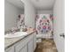 Bathroom featuring granite countertops, a stylish shower curtain, and tile flooring at 227 Sumter Ct, Burlington, NC 27217