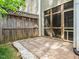 Outdoor patio featuring a brick surface and a wooden fence at 23 Great View Ct, Clayton, NC 27527