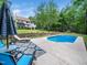 Backyard with an in-ground swimming pool, patio area with furniture, and a lush lawn for outdoor enjoyment at 2312 Laurelford Ln, Wake Forest, NC 27587