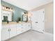 This spacious bathroom features double sinks with modern fixtures, generous cabinet space, and ample lighting at 2312 Laurelford Ln, Wake Forest, NC 27587