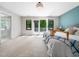 Bright and spacious main bedroom with private balcony access and en suite bathroom with glass enclosed shower at 2312 Laurelford Ln, Wake Forest, NC 27587