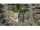 An aerial view shows the layout of the home and surrounding landscape at 2437 Everstone Rd, Wake Forest, NC 27587