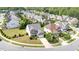 Suburban homes with manicured lawns sit nestled within a well-planned residential community at 2437 Everstone Rd, Wake Forest, NC 27587