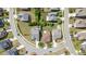 Aerial view of neighborhood homes featuring well-maintained lawns and landscaping at 2437 Everstone Rd, Wake Forest, NC 27587