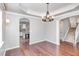 Elegant dining room with hardwood floors is conveniently located next to the kitchen and stairway at 2437 Everstone Rd, Wake Forest, NC 27587