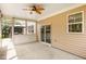 Covered patio with a ceiling fan and slider doors at 2437 Everstone Rd, Wake Forest, NC 27587