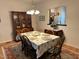 Formal dining room with hardwood floors, area rug, and traditional furnishings at 2528 Beech Gap Ct, Raleigh, NC 27603