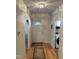 Inviting entryway featuring hardwood floors, a front door with decorative window, and arched doorway at 2528 Beech Gap Ct, Raleigh, NC 27603