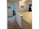 Upstairs hallway with carpet and white painted walls at 2528 Beech Gap Ct, Raleigh, NC 27603