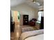View of the well-appointed main bedroom with a vaulted ceiling at 2528 Beech Gap Ct, Raleigh, NC 27603