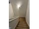 Carpeted staircase leading to the lower level or basement at 2528 Beech Gap Ct, Raleigh, NC 27603