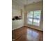 Bright dining room featuring hardwood floors, a chandelier, and a built-in display nook at 2565 Bent Green St, Raleigh, NC 27614