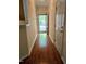 Inviting entryway featuring hardwood floors and an exterior view at 2565 Bent Green St, Raleigh, NC 27614