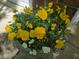 Potted flowers with yellow and white blooms at 2565 Bent Green St, Raleigh, NC 27614
