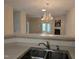 Kitchen with view into dining and living rooms at 2565 Bent Green St, Raleigh, NC 27614